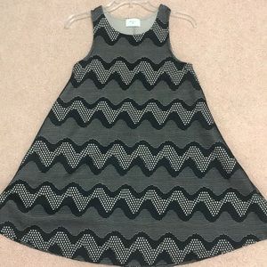 Everly black dress with a cream underlining
